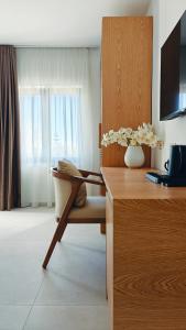 TV a/nebo společenská místnost v ubytování VILLA MARGARIT Boutique Hotel