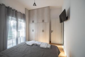 Postel nebo postele na pokoji v ubytování La Terra Nostra city