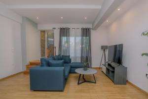 TV a/nebo společenská místnost v ubytování La Terra Nostra city