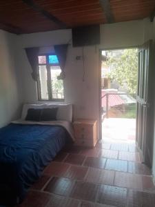 Postel nebo postele na pokoji v ubytování Hotel Mahoma