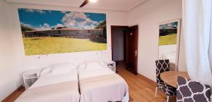 Posezení v ubytování Hostal Cachiño