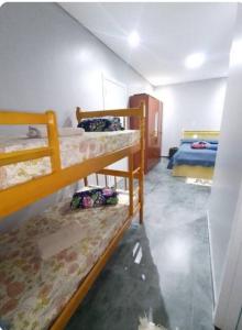 Postel nebo postele na pokoji v ubytování Pousada Lar do Sossego