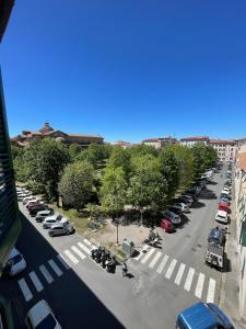 an aerial view of a parking lot with cars at La Casina di Chloe in Livorno