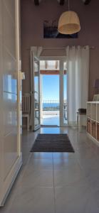 a living room with a view of the ocean at Casa Bella Vista in Moraira +12 photos