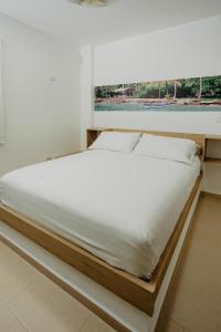 Postel nebo postele na pokoji v ubytování Hotel Plataneras Plaza