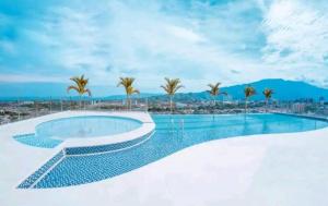 Бассейн в Apartamento Luxury ubicado en la mejor zona comercial de la ciudad или поблизости
