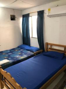 Postel nebo postele na pokoji v ubytování Casa Santorini II