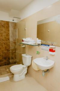 Koupelna v ubytování Hotel Plataneras Plaza