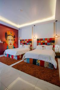 Postel nebo postele na pokoji v ubytování TRES79 Hotel Boutique Orizaba