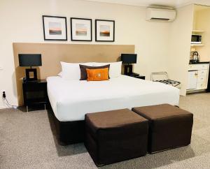 Voodi või voodid majutusasutuse Hotel on Devonport toas