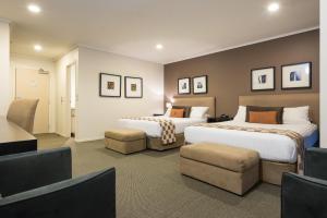 Voodi või voodid majutusasutuse Hotel on Devonport toas