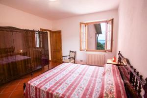 En eller flere senge i et værelse på Villino Mare e Natura