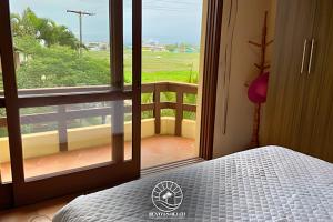 Gallery image of Apto 2 quartos na praia de Torres - 500mts do mar - Varanda com churrasqueira - Tv Smart - Wifi - Garagem - Aceita Pet in Passo de Torres