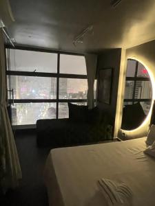 Infinite Lighthouse View客房内的一张或多张床位