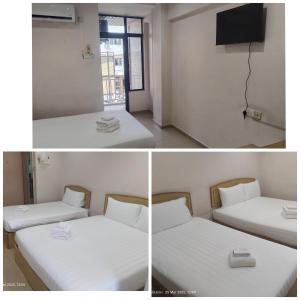 Ένα ή περισσότερα κρεβάτια σε δωμάτιο στο BBHotel