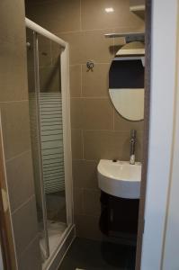 Koupelna v ubytování Hotel Evergreen