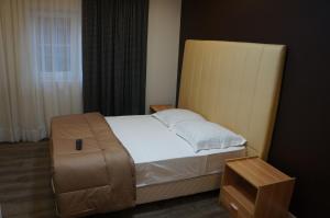 Postel nebo postele na pokoji v ubytování Hotel Evergreen