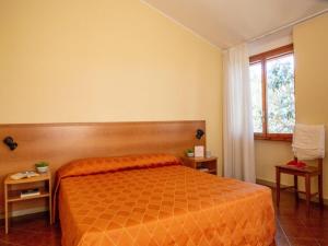 Postel nebo postele na pokoji v ubytování Studio in einer Ferienanlage mit Pool