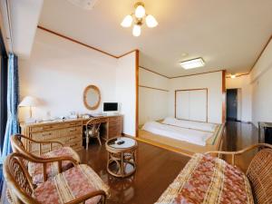 Postel nebo postele na pokoji v ubytování Resort Hotel Umibe no Kajuen + 37 fotografií