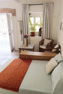 Postel nebo postele na pokoji v ubytování GREAT LOCATION ! 4 Bedroom Home in the Heart of Cartagena + 22 fotografií