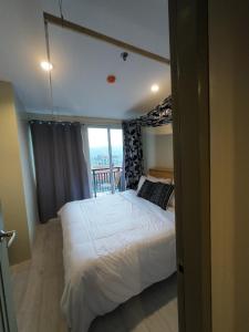 Katil atau katil-katil dalam bilik di Cityscape Grand Tower - Lexis Suite 2BR, Across Ayala Mall, Near Cebu IT Park