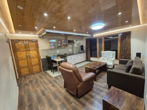 Posezení v ubytování New Maya Home Stay