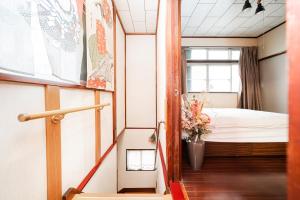 Ένα ή περισσότερα κρεβάτια σε δωμάτιο στο Japanese Traditional Villa 8ppl 5min to ST