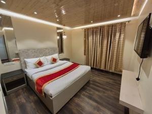 Postel nebo postele na pokoji v ubytování New Maya Home Stay + 6 fotografií