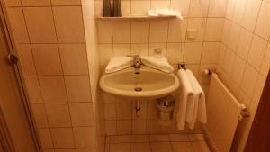 Koupelna v ubytování Gasthof Pension Gregori