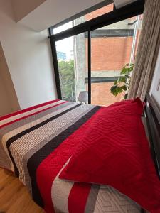 Ένα ή περισσότερα κρεβάτια σε δωμάτιο στο Roma Norte, pool, gym, rooftop, coworking, balcony & parking +20 φωτογραφίες