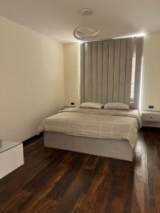 Ένα ή περισσότερα κρεβάτια σε δωμάτιο στο Safari