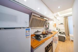 Cucina o angolo cottura di 柃居 B&B - Huaihai Middle Road Branch