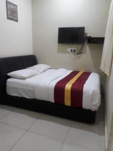 Postel nebo postele na pokoji v ubytování Camlodge budget hotel