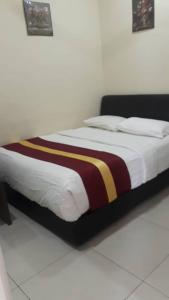 Postel nebo postele na pokoji v ubytování Camlodge budget hotel