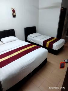 Postel nebo postele na pokoji v ubytování Camlodge budget hotel