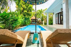 Swimmingpoolen hos eller tæt på Villa Canggu