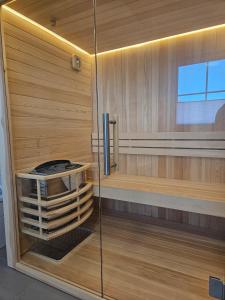 Gambar di galeri bagi Ferienhaus am See mit Sauna di Rheinsberg