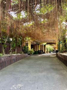a building with a lot of nets hanging from the ceiling at Casa Verde Hotel & Events Center in Imus
