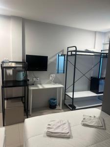 Postel nebo postele na pokoji v ubytování Georgetown Hotel