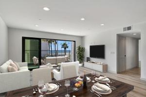 a living room with a couch and a table at South Beach Living #1 in Imperial Beach