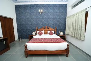 Postel nebo postele na pokoji v ubytování Jai Niwas Palace Resort + 5 fotografií