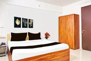 Super Collection O Baner formerly Seven Hills客房内的一张或多张床位