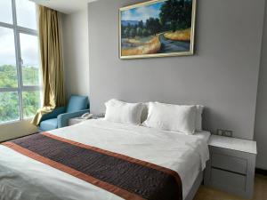 Postelja oz. postelje v sobi nastanitve Meritz Hotel