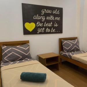 Postel nebo postele na pokoji v ubytování Eyy Hostel Panglao