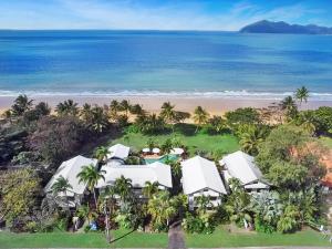 an aerial view of a resort on the beach at Wongalinga Beachfront Apt 2 in Mission Beach