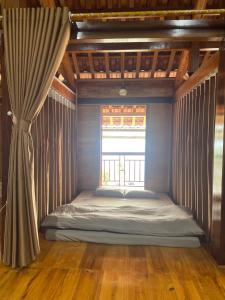 Postel nebo postele na pokoji v ubytování Laco Homestay