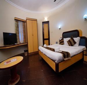 TV a/nebo společenská místnost v ubytování Greencoconutresort