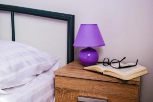 Postel nebo postele na pokoji v ubytování Smart Apartments
