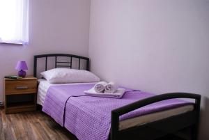 Postel nebo postele na pokoji v ubytování Smart Apartments