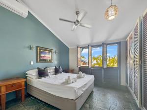 Ένα ή περισσότερα κρεβάτια σε δωμάτιο στο Wongalinga Beachfront Apt 5 +15 φωτογραφίες